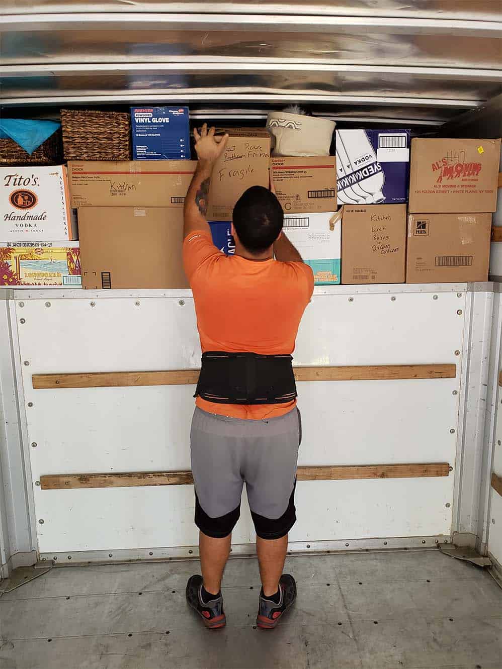MechaMovers employee picking the boxes