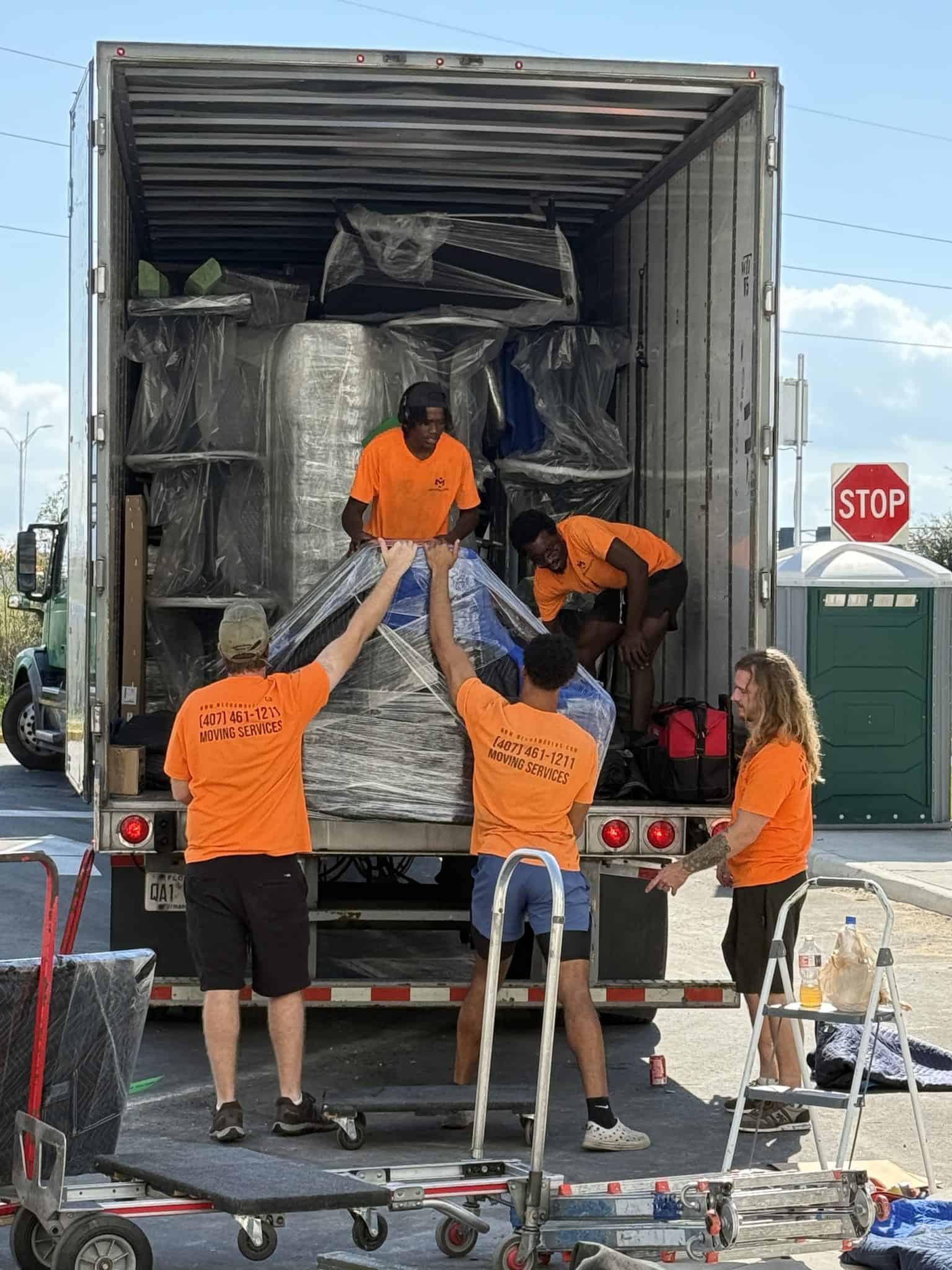 MechaMovers crew loading the truck